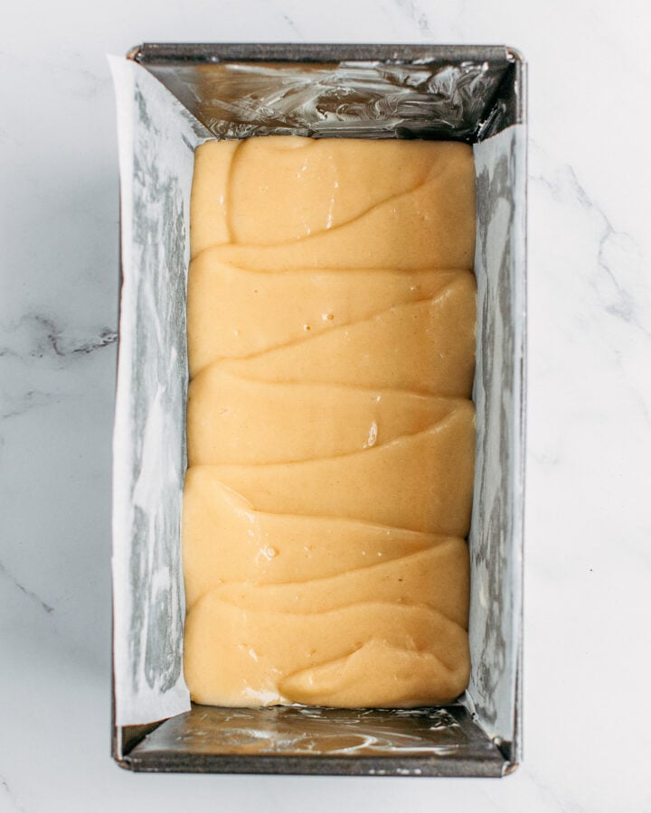 Vanilla cake batter in a loaf pan.