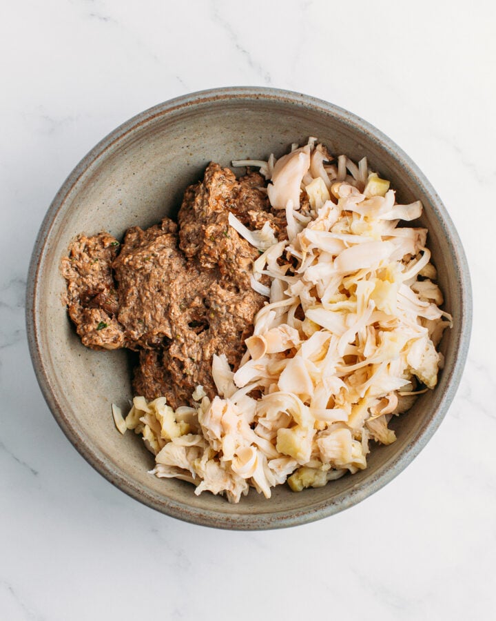 Mushroom paste and shredded jackfruit in a bowl.