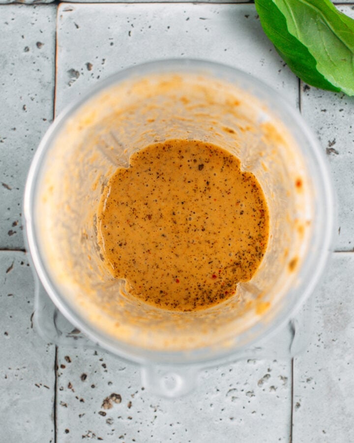 Blended sun-dried tomato, oil, and seasonings in a small blender.