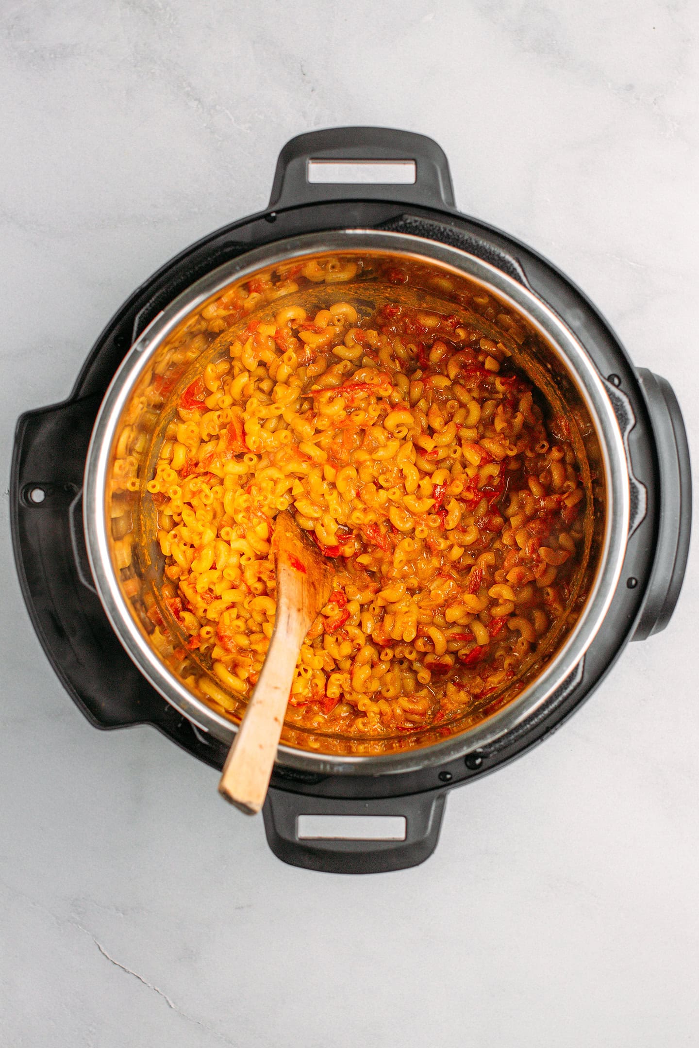 Macaroni cooked in tomato sauce in an Instant Pot.