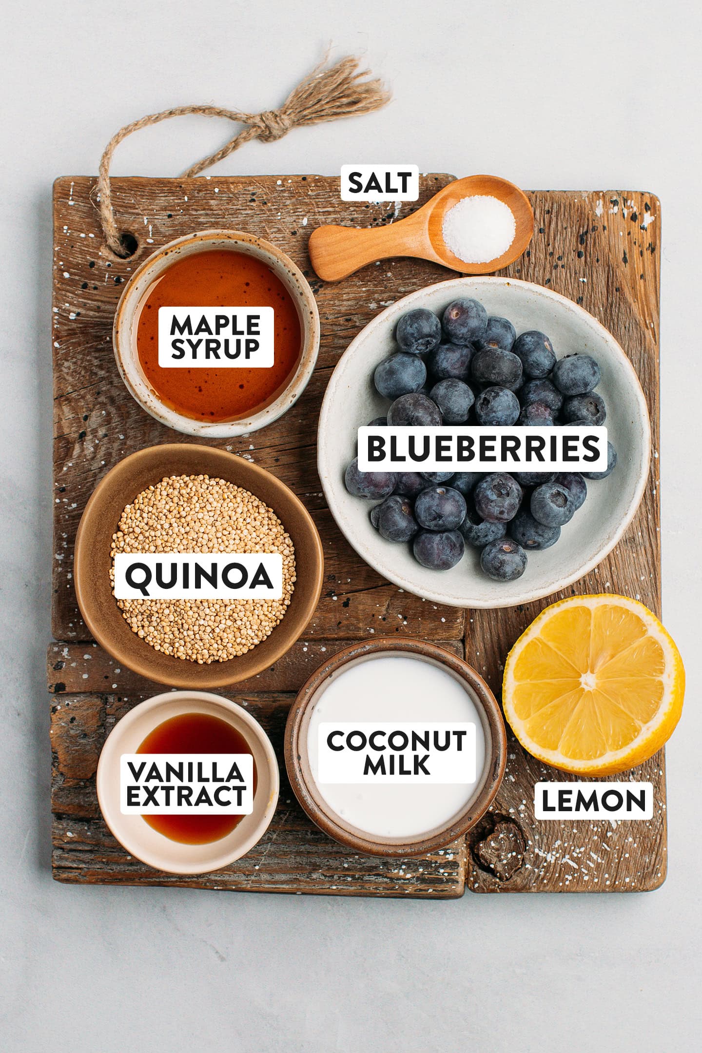 Ingredients like blueberries, maple syrup, quinoa, coconut milk, and lemon.