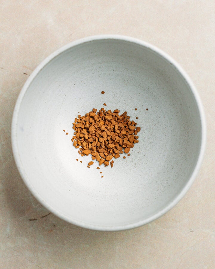 Instant coffee in a small bowl.