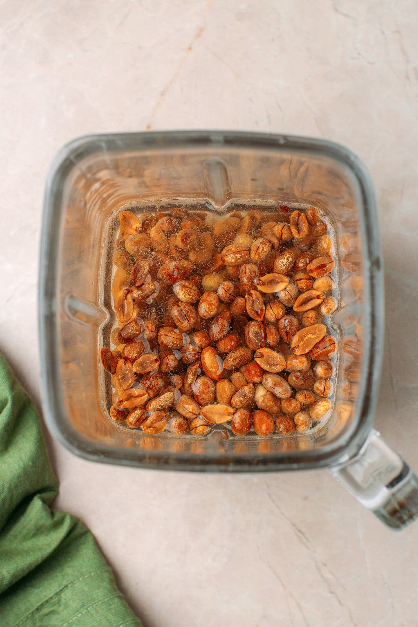 Roasted peanut and water in a blender.