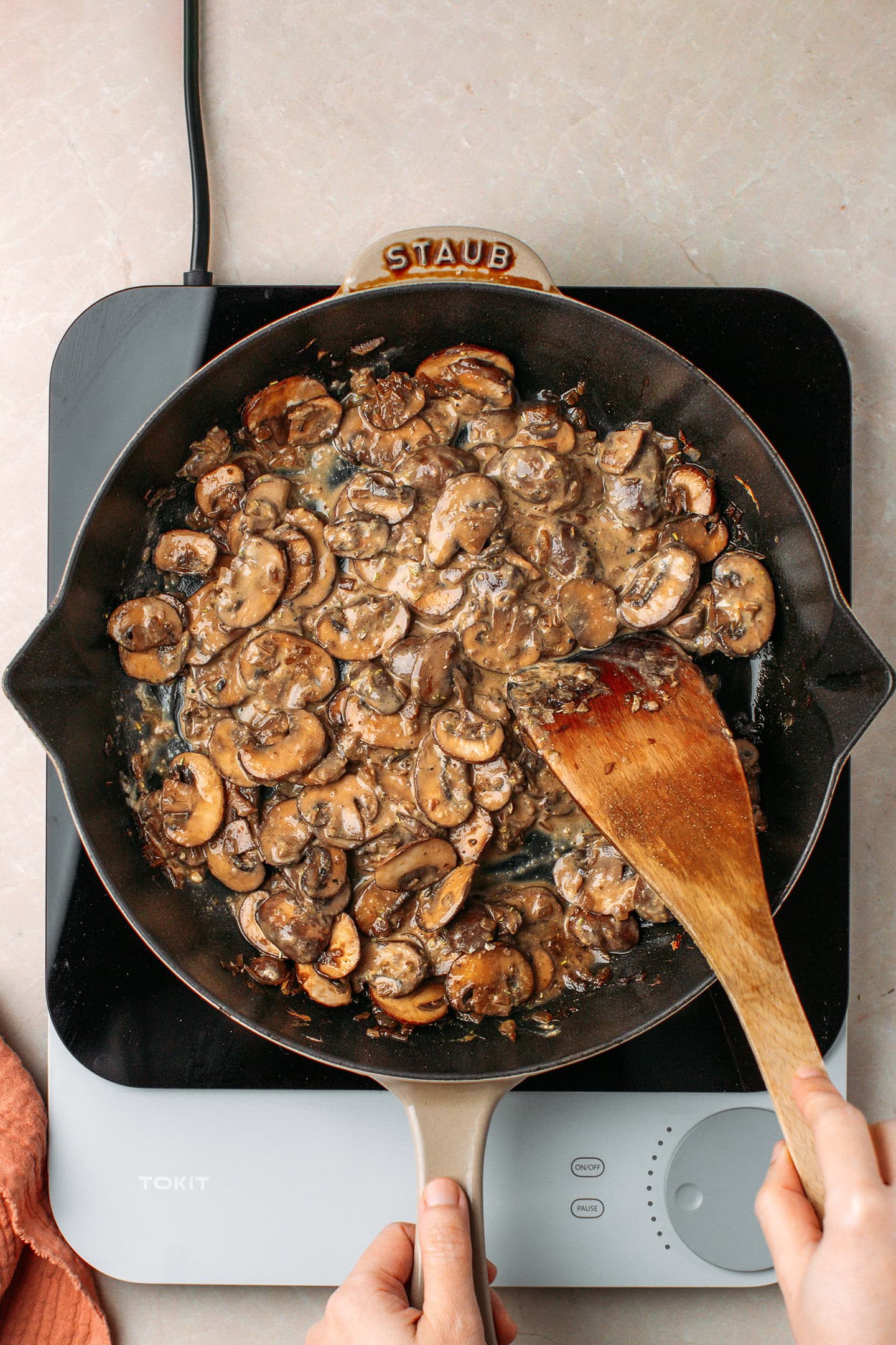 Creamy mushroom filling in a skillet.