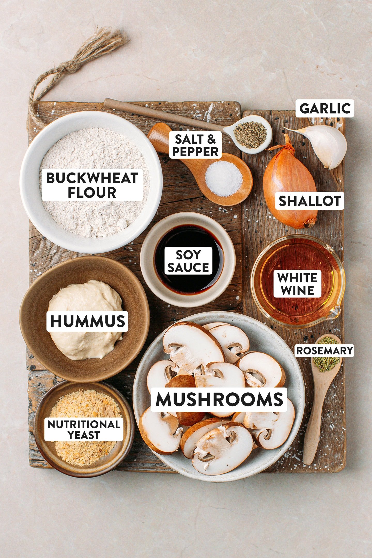 Ingredients like buckwheat flour, soy sauce, hummus, mushrooms, and white wine.