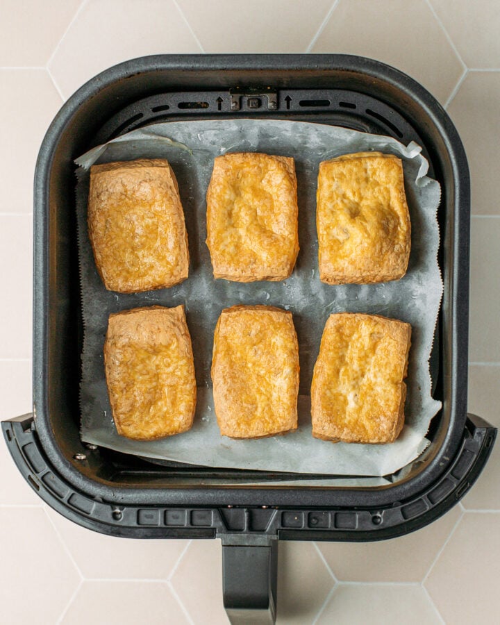 Golden brown tofu after air frying.