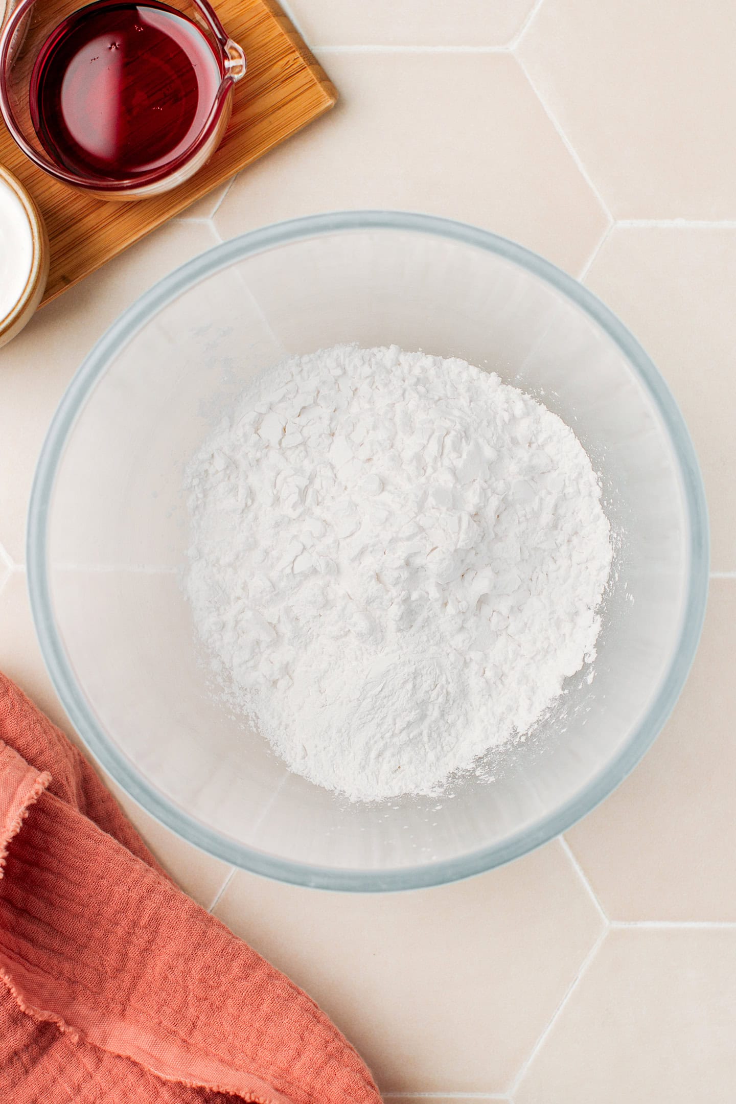 Tapioca starch, rice flour, and sugar in a glass bowl.