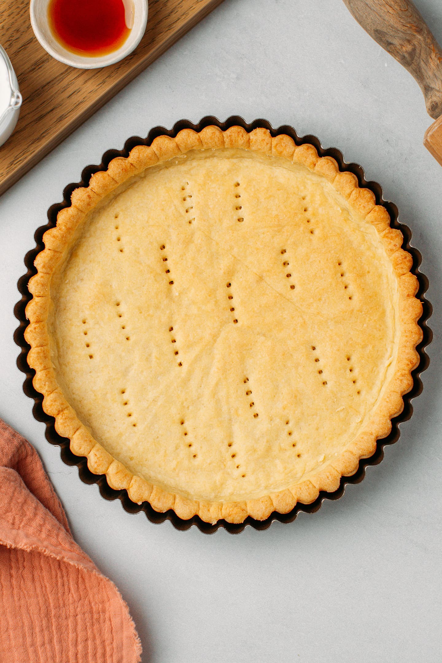 Baked crust inside a pie pan.