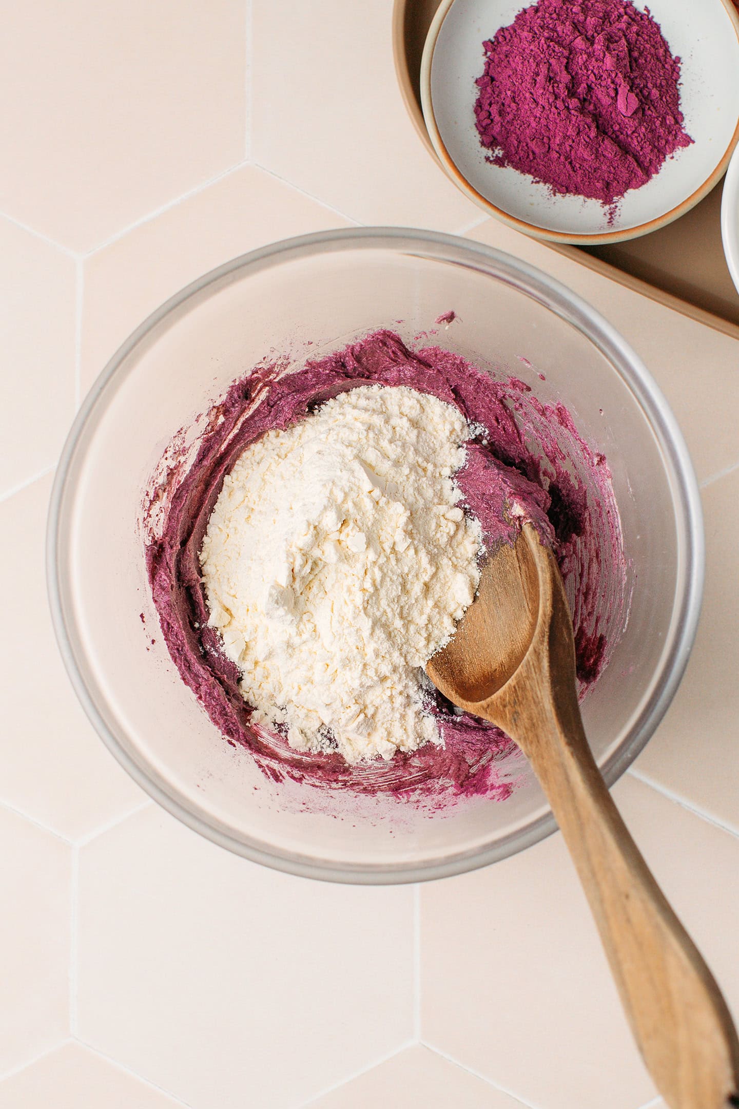 Creamed ube powder and flour in a bowl.
