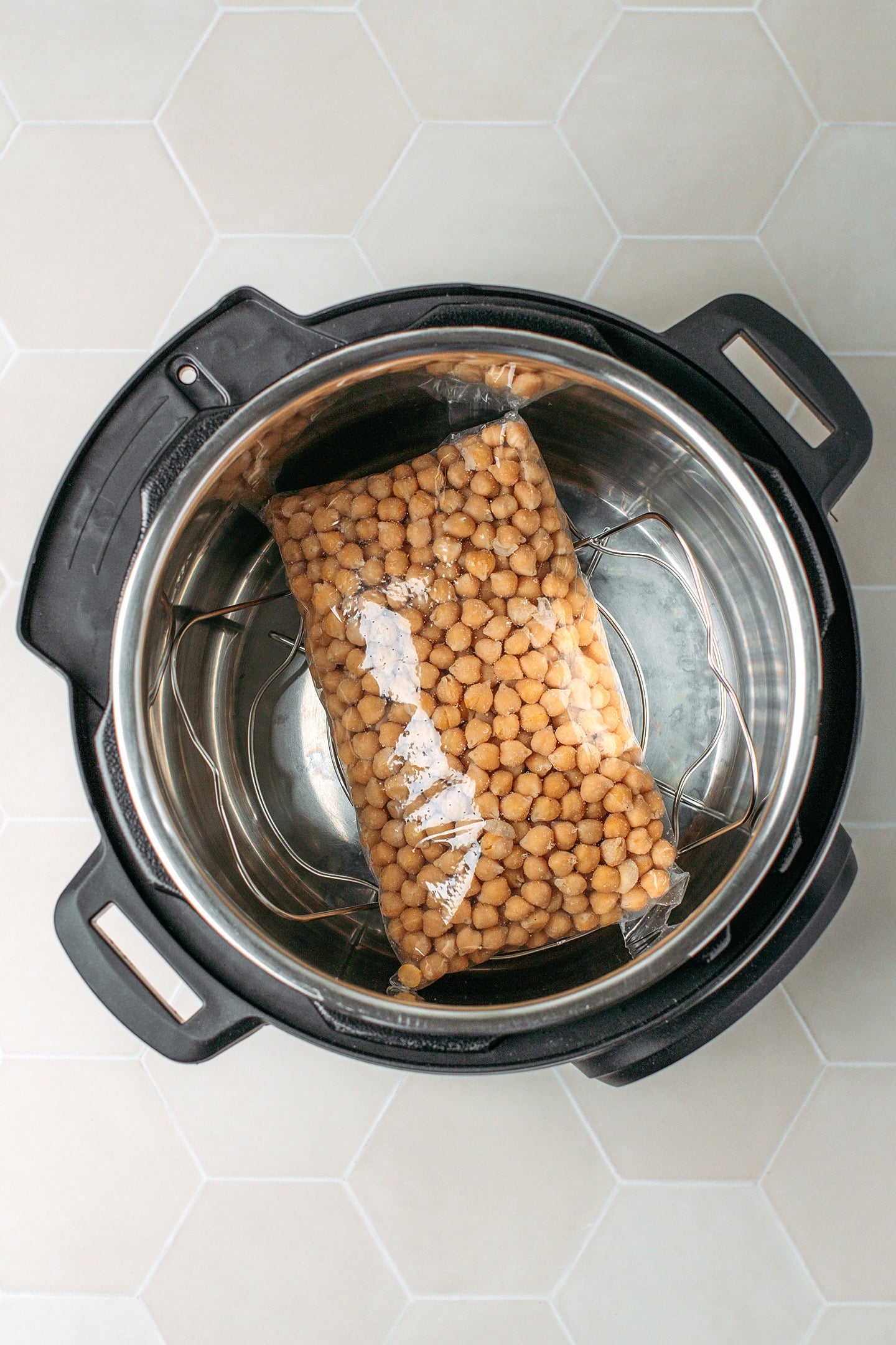 Bag of packed chickpeas in an Instant Pot.