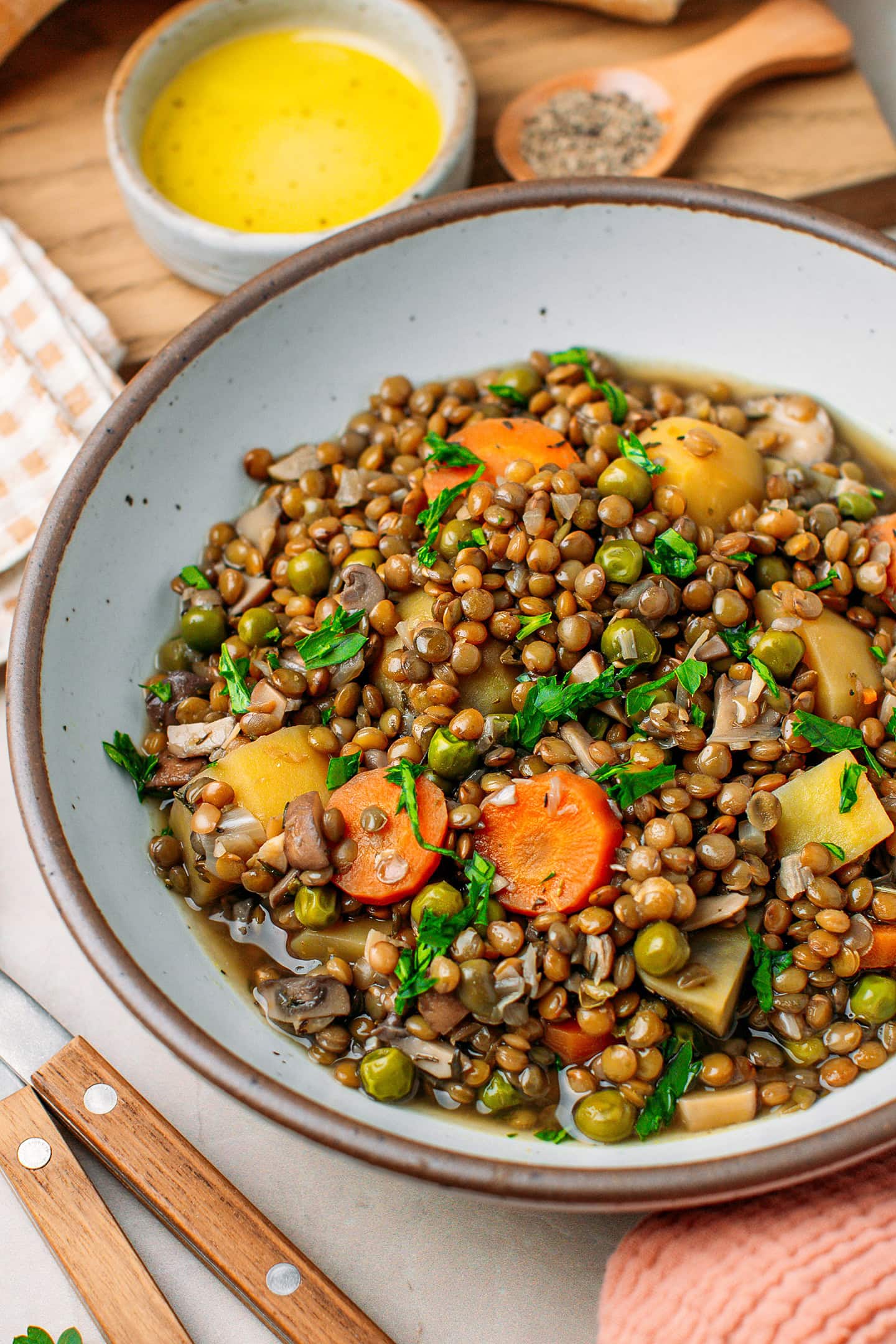 Close-up of a bowl of green lentil stew.