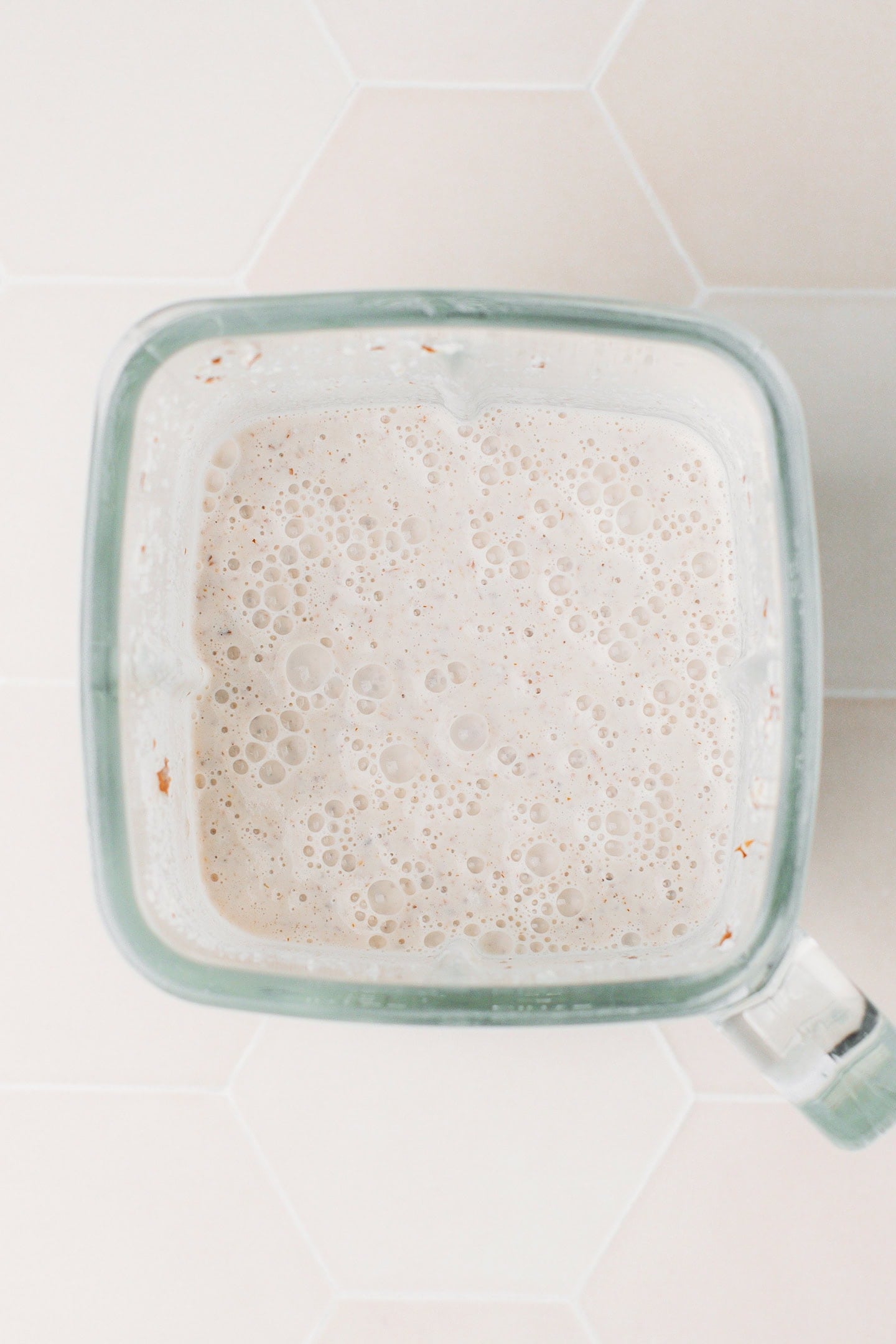 Blended almonds and water in a blender.