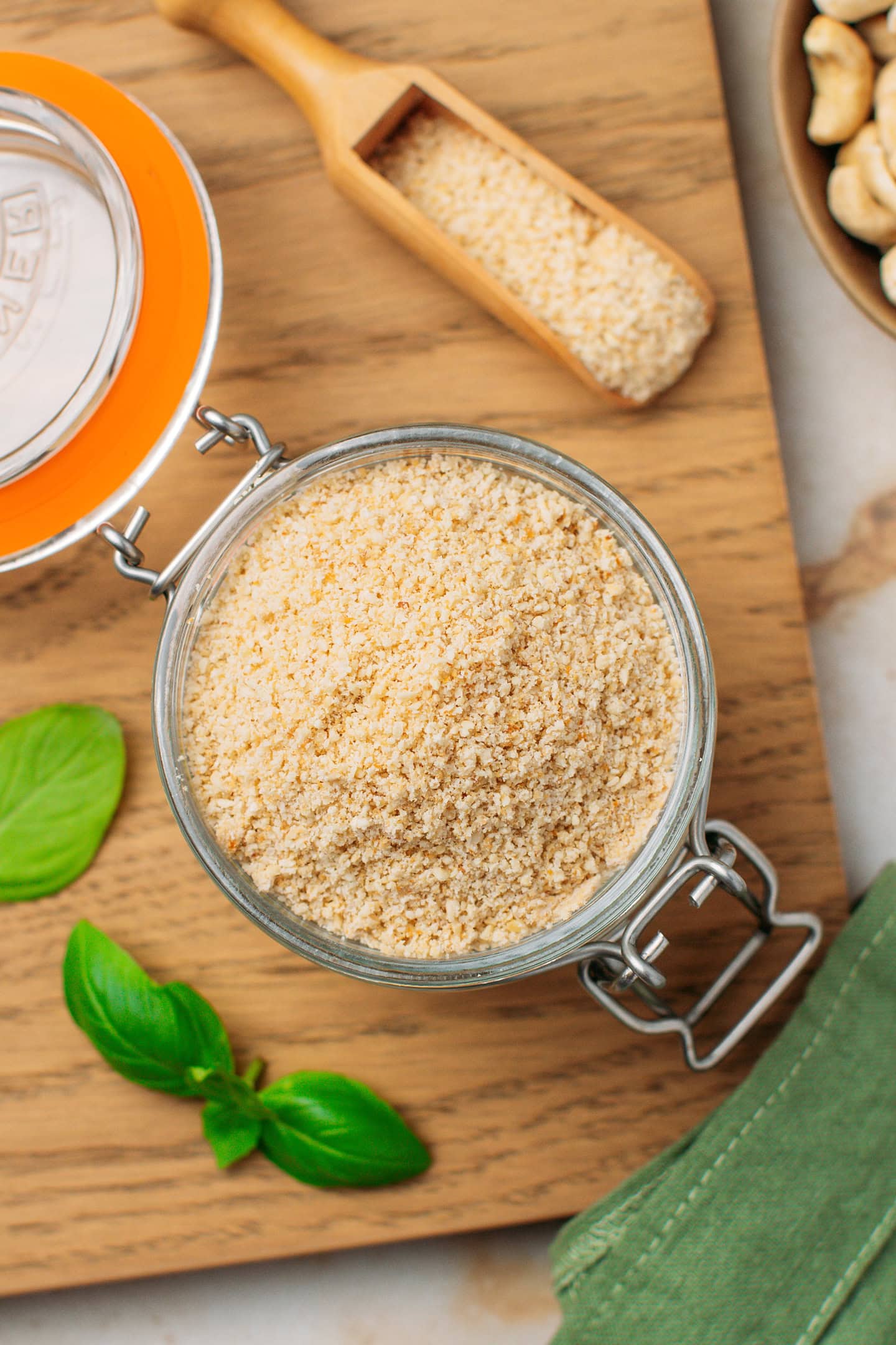 Top view of a jar filled with vegan parmesan.