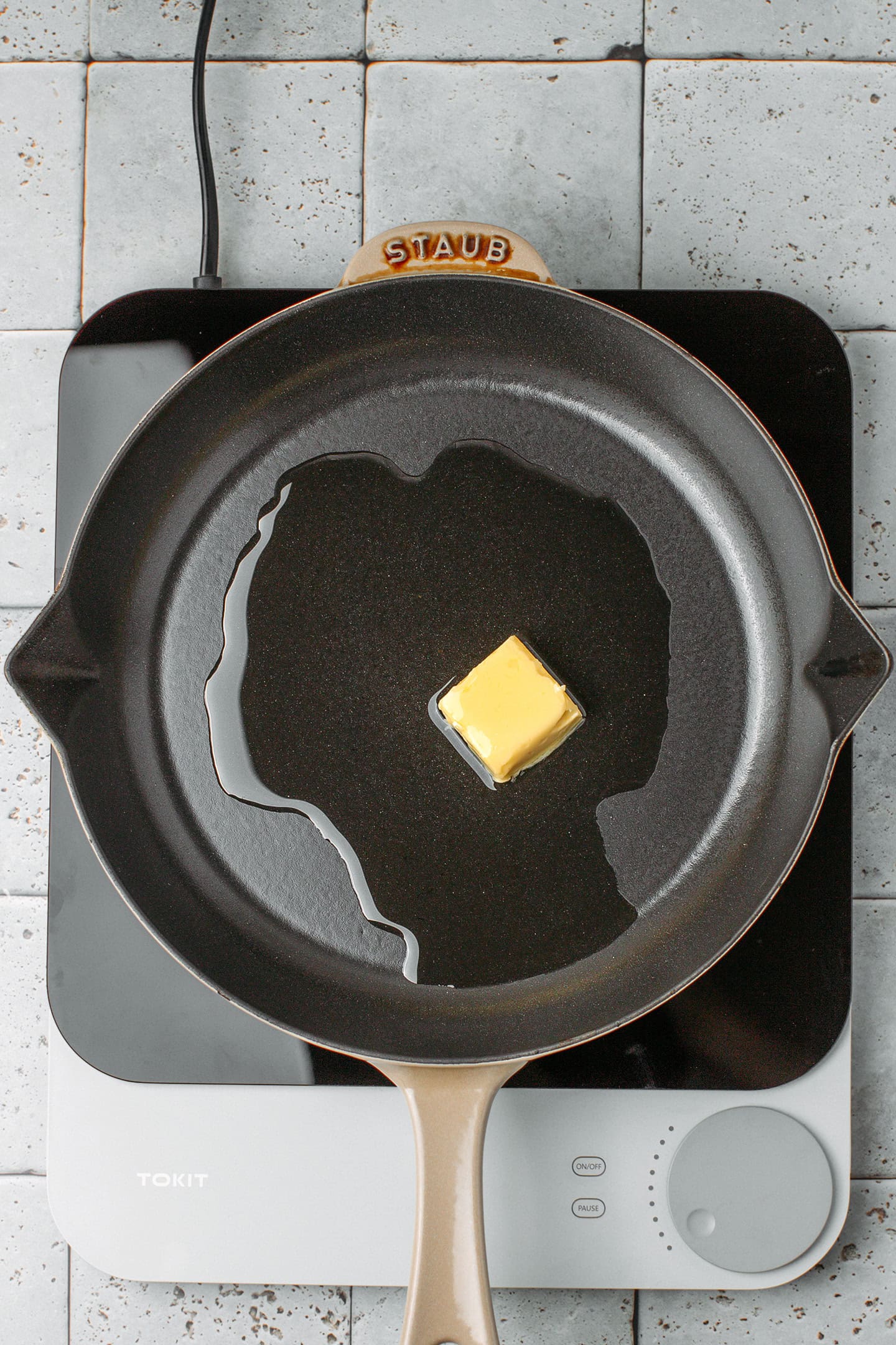 Vegan butter and oil in a skillet.