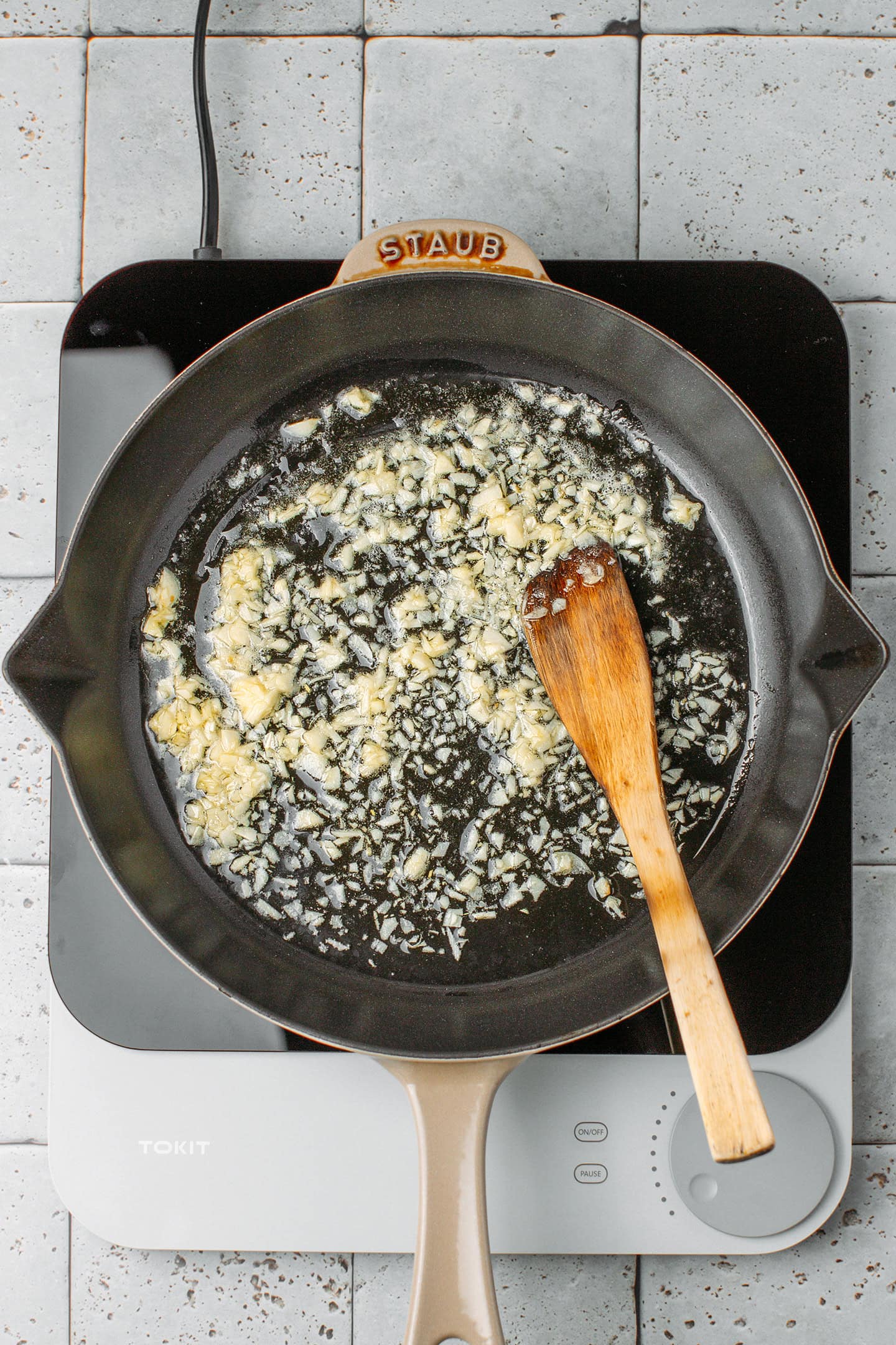 Sautéed garlic in a skillet.