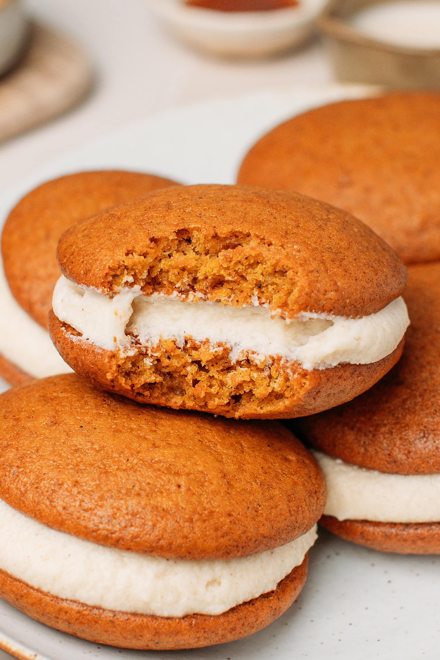 Pumpkin whoopie pie with a bite.